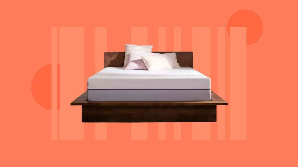 A bed featuring a Purple Plus mattress and lots of pillows is displayed against an orange background.